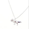 Silver dinosaur pendant on a chain