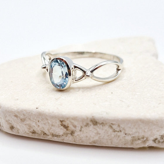 Blue Topaz Twist Silver Ring