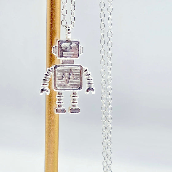 handcrafted robot pendant. retro vibes