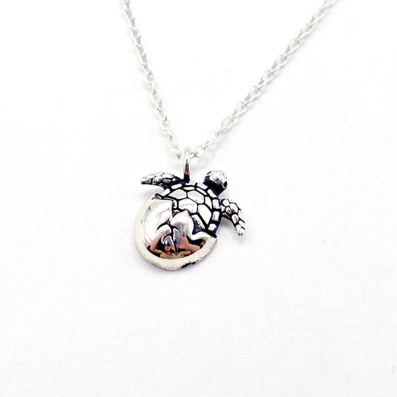 Silver necklace with a turtle pendant