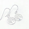 Silver tree of life earrings on a white background