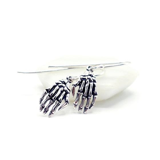 skeleton hands earrings
