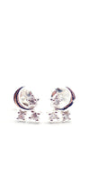 Pair of silver earrings with small diamonds 
