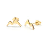 Gold mountain-shaped earrings on a white background