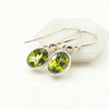 Silver earrings with green peridot gemstone