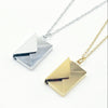 Envelope pendant with letter inside. Made of stainless steel availile in Gold and Silver. Part of the engravable collection