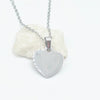 A silver heart-shaped pendant necklace on a delicate silver chain, made with stainlesss teel, Part of our engravable range