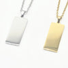 Two minimalist rectangular pendant necklaces, one in polished silver and the other in polished yellow gold. Parrt of ouur engravvable range