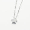 A minimalist high-polish stainless steel necklace featuring a dainty, solid five-point star pendant on a delicate cable chain, made with stainless steel