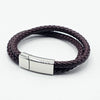 A dark brown braided leather bracelet with a polished  stainless steel silver-toned rectangular magnetic clasp. Part of the engravable olletion