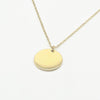A minimalist high-polish stainless steel necklace featuring a blank 15mm round disk pendant