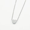 A minimalist high-polish stainless steel necklace featuring a dainty, solid heart pendant on a delicate cable chain,Availble in gold and silver. Part of the engravable range