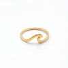 A thin gold ring with a wavy, open-ended design.