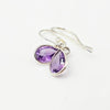 A pair of silver drop earrings with teardrop-shaped purple amethyst gemstones, Made with 925 Sterling Silver