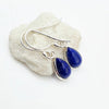 A pair of silver drop earrings with teardrop-shaped Blue Lapis gemstones, Made with 925 Sterling Silver
