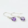 A pair of silver drop earrings with teardrop-shaped purple amethyst gemstones, Made with 925 Sterling Silver